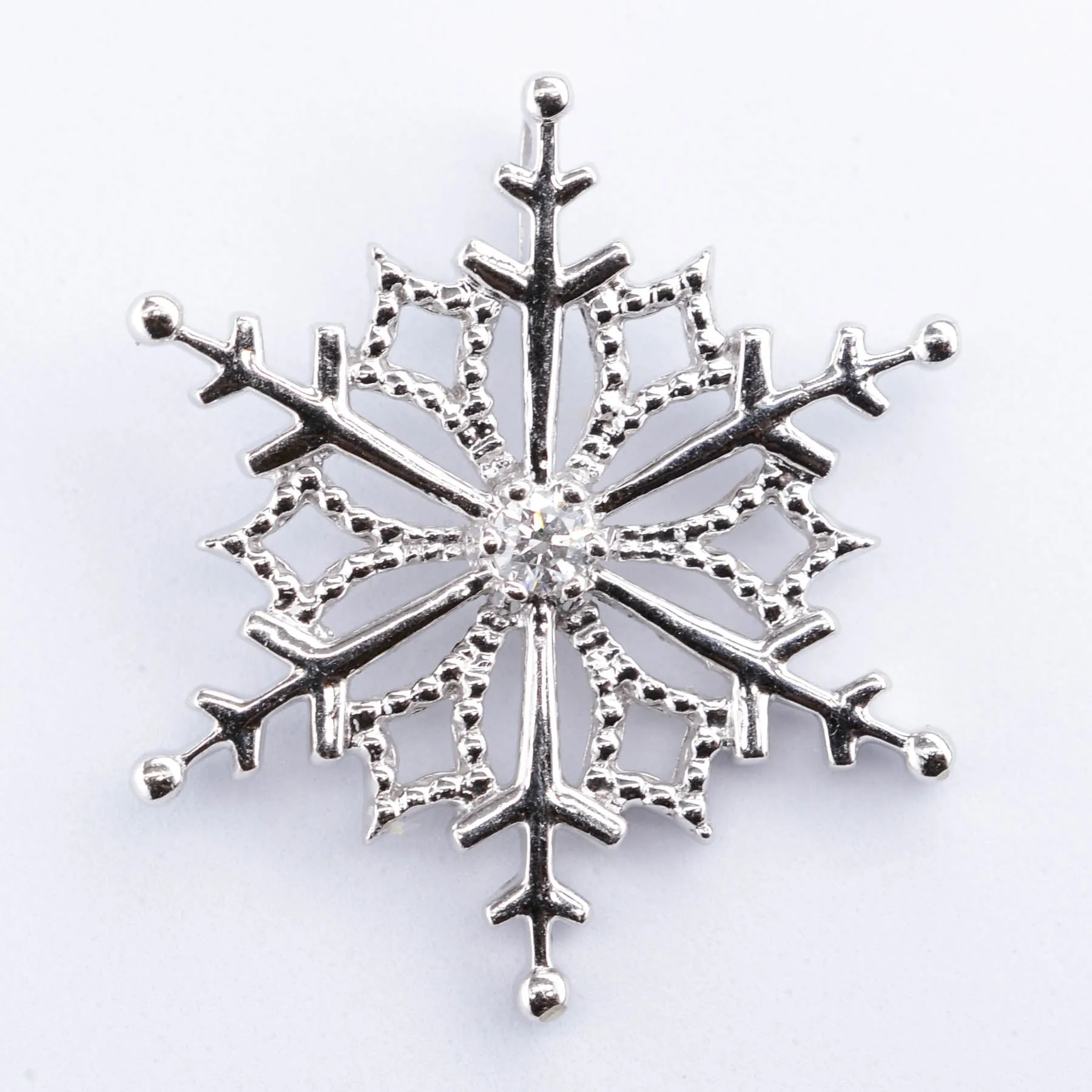 10k Diamond Snowflake Pendant | 0.03ct |