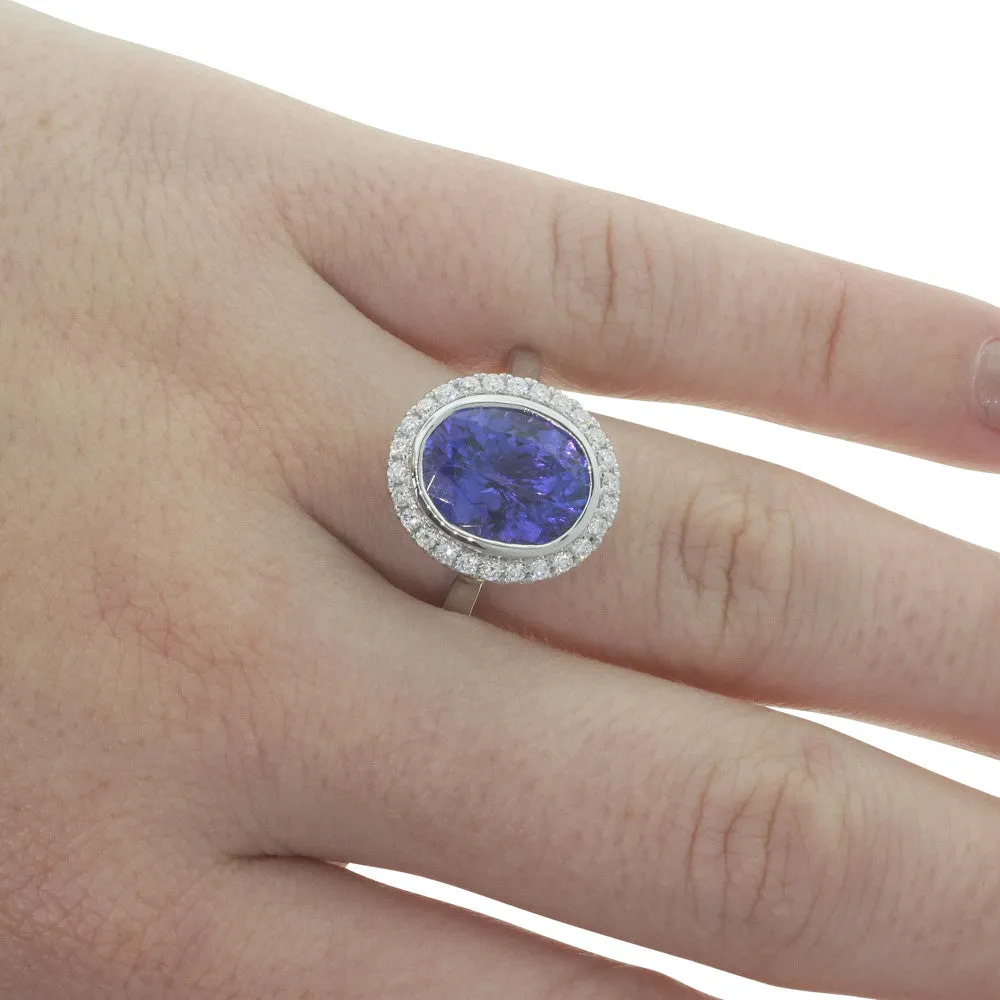 18ct White Gold Tanzanite & Diamond Halo Ring